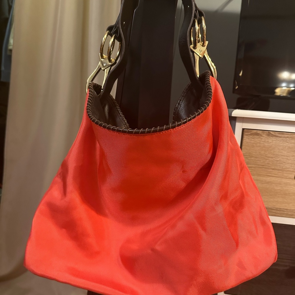 Chic Red Shoulder Bag with Gold Accents
